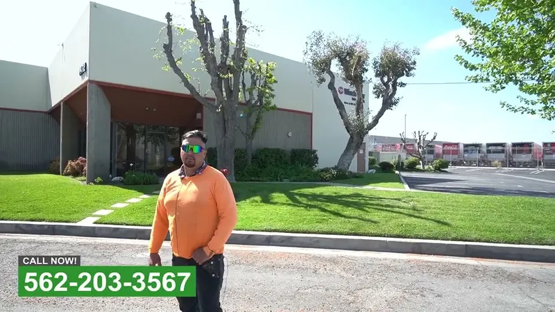 Play video: Tree trimming at a Santa Ana commercial property